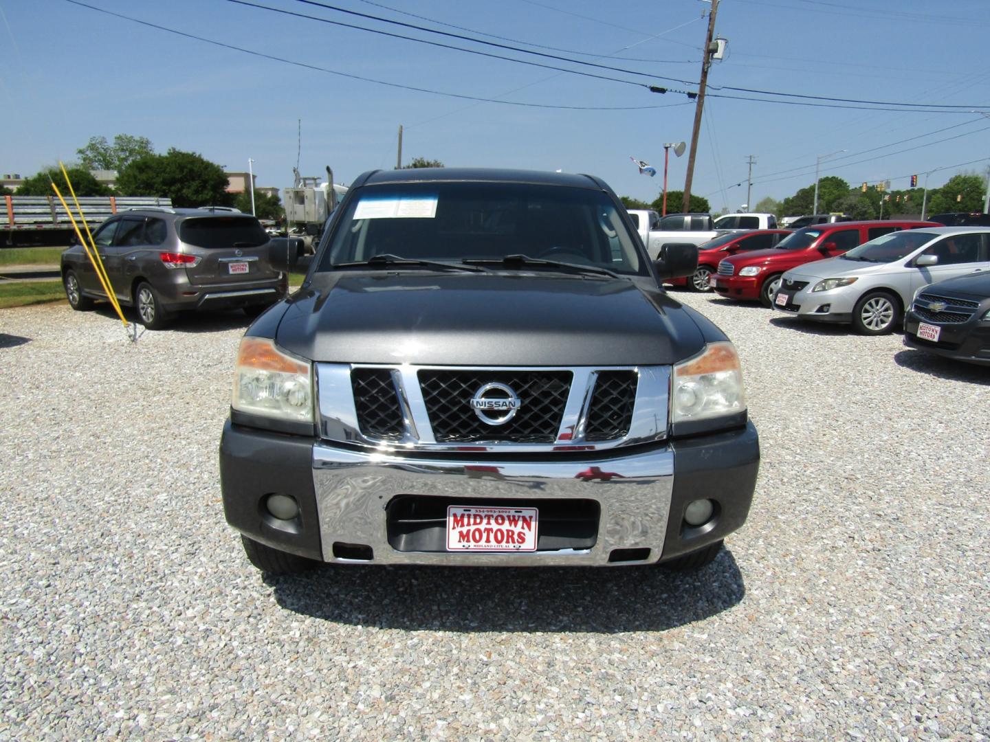 2011 Gray Nissan Titan SV Crew Cab 2WD (1N6BA0ED4BN) with an 5.6L V8 DOHC 32V FFV engine, Automatic transmission, located at 15016 S Hwy 231, Midland City, AL, 36350, (334) 983-3001, 31.306210, -85.495277 - Photo#1